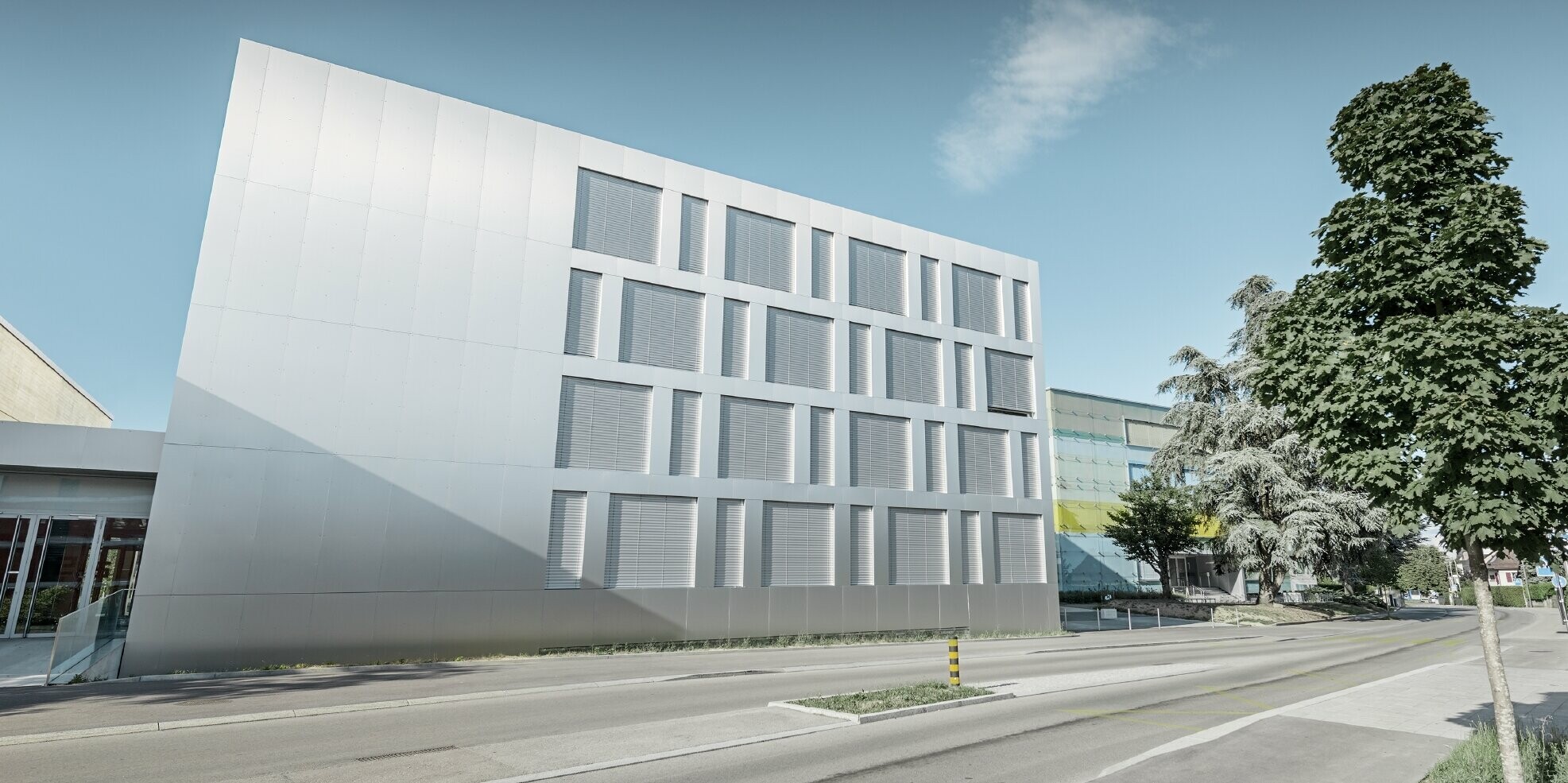 Modernes Schulgebäude mit Flachdach und einer Fassade mit den PREFA Aluminium Verbundplatten in Aluminium gebürstet